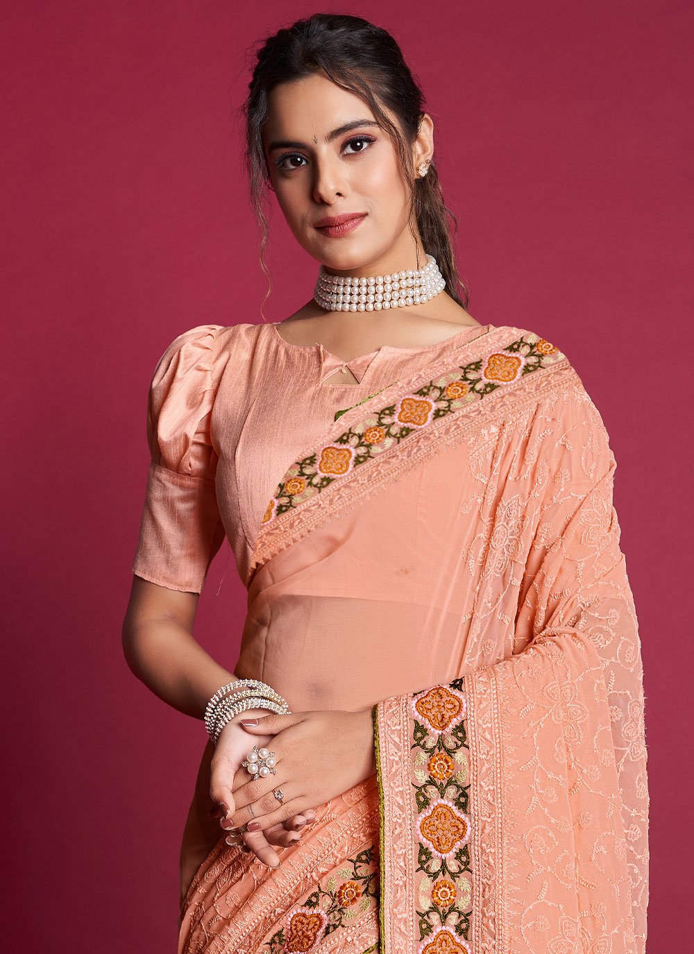 Contemporary Georgette Peach Embroidered Saree