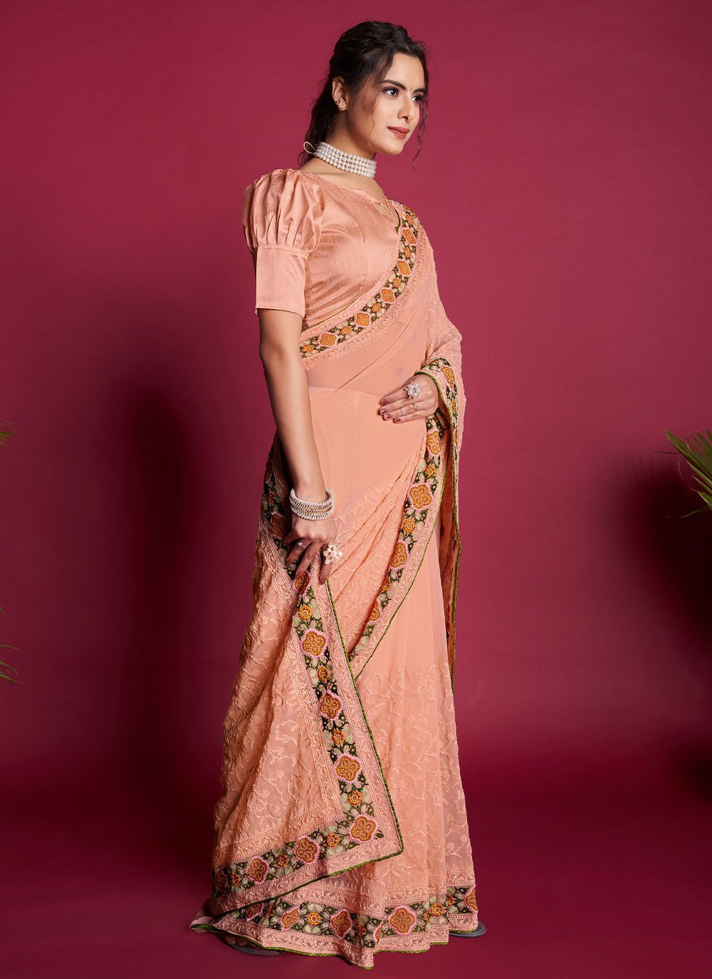 Contemporary Georgette Peach Embroidered Saree