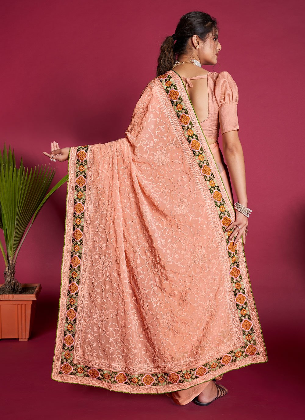 Contemporary Georgette Peach Embroidered Saree