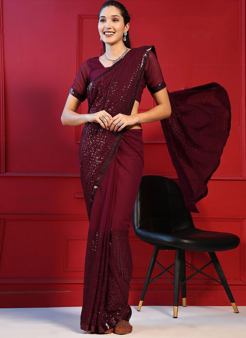 Classic Georgette Purple Embroidered Saree