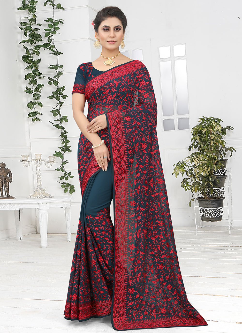 Classic Georgette Teal Embroidered Saree