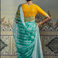 Contemporary Brasso Turquoise Fancy Work Saree