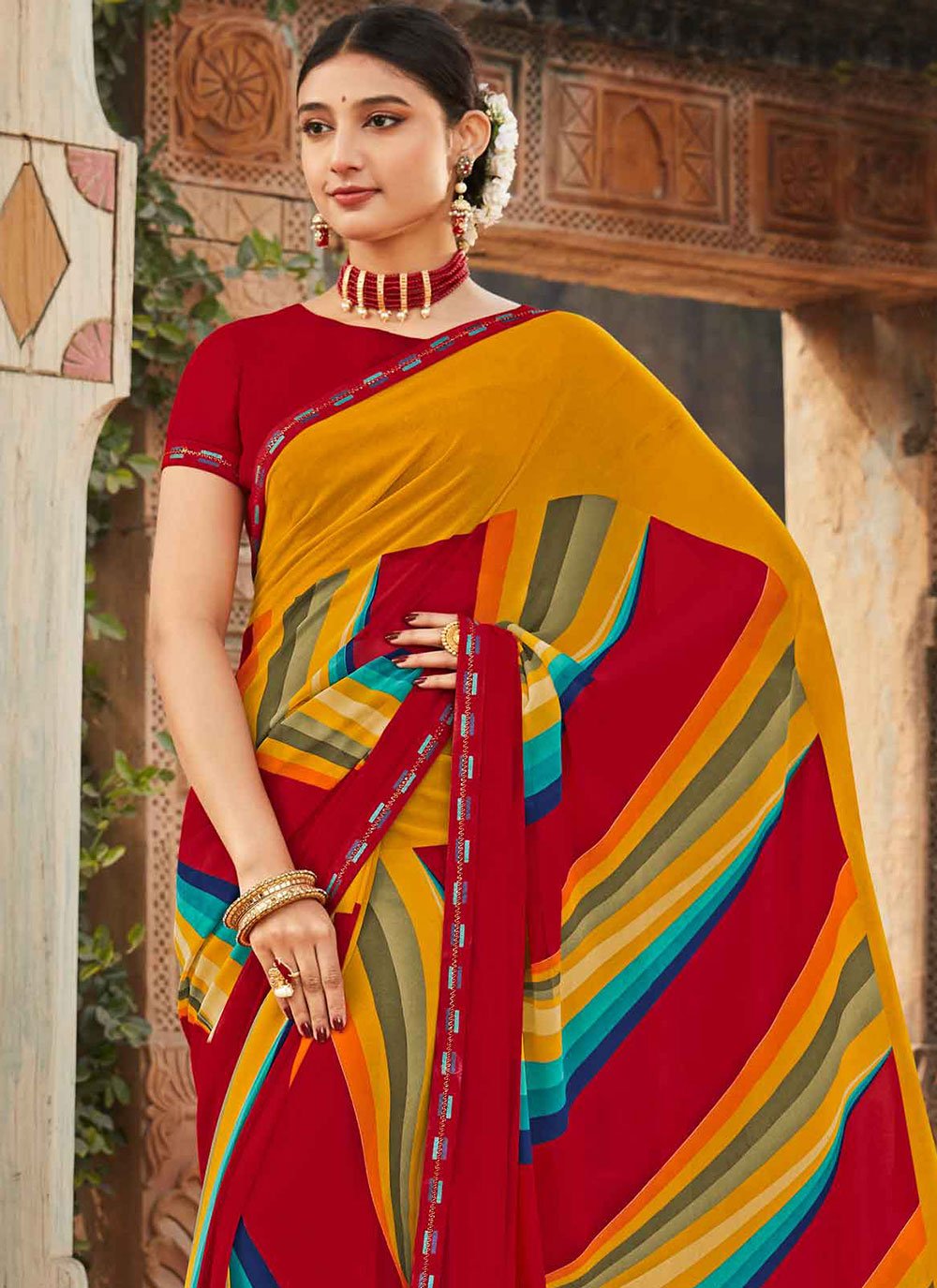 Contemporary Georgette Multi Colour Fancy Work Saree