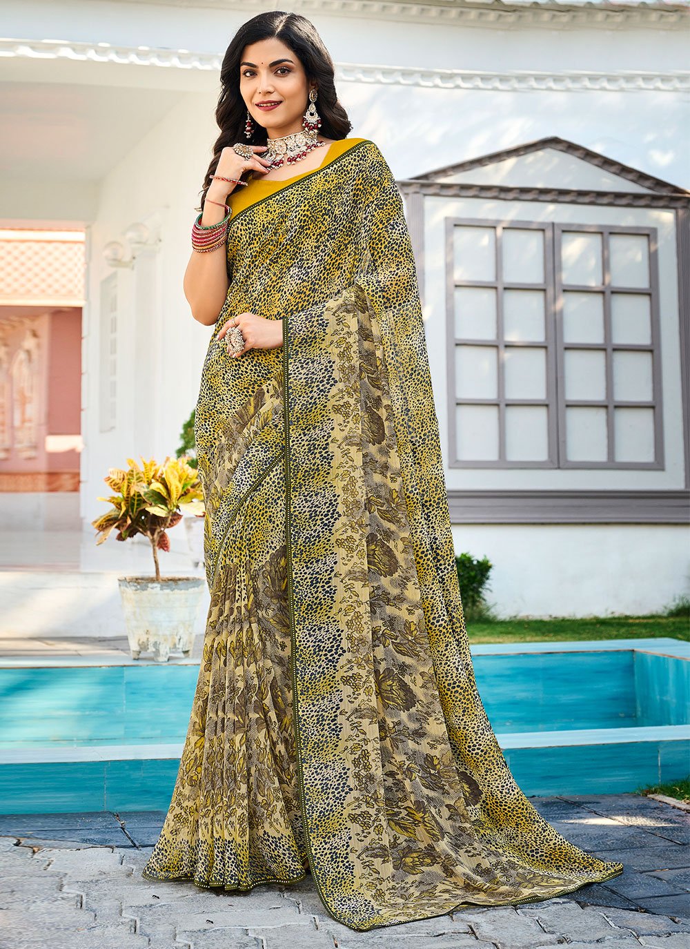 Contemporary Designer Georgette Multi Colour Fancy Work Saree