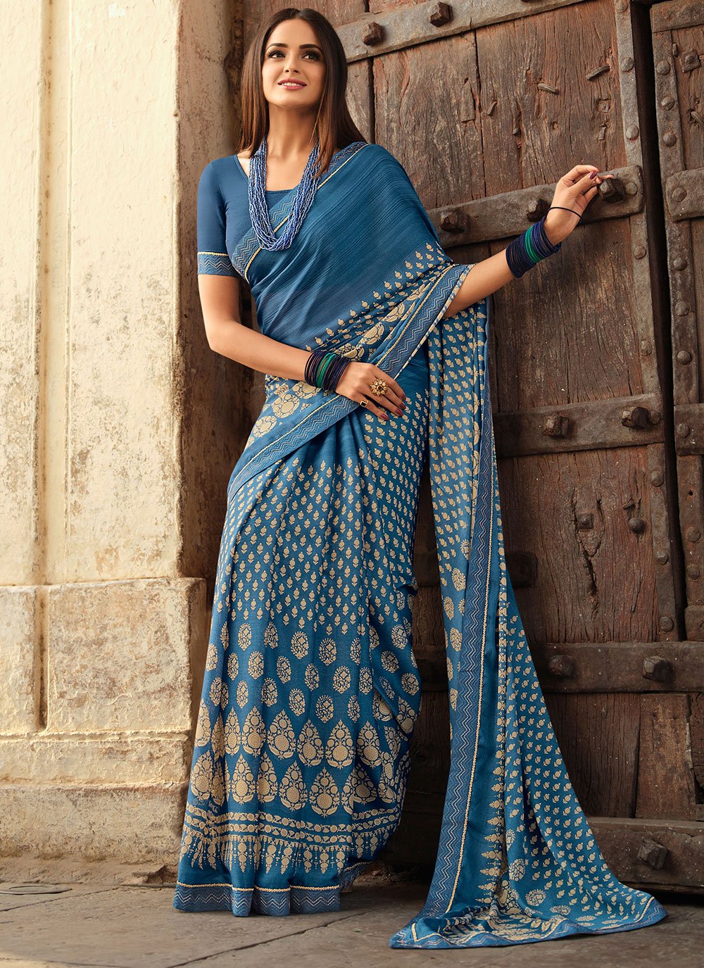 Contemporary Georgette Aqua Blue Lace Saree