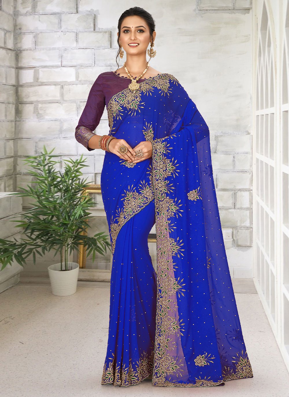 Classic Georgette Blue Hand Work Saree