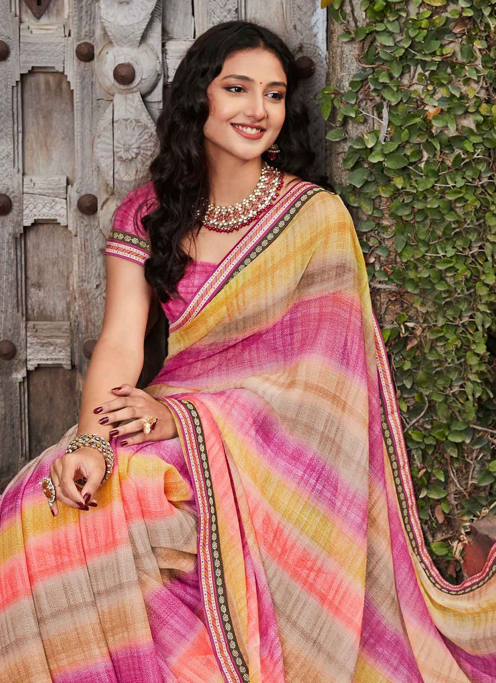 Contemporary Georgette Multi Colour Fancy Work Saree