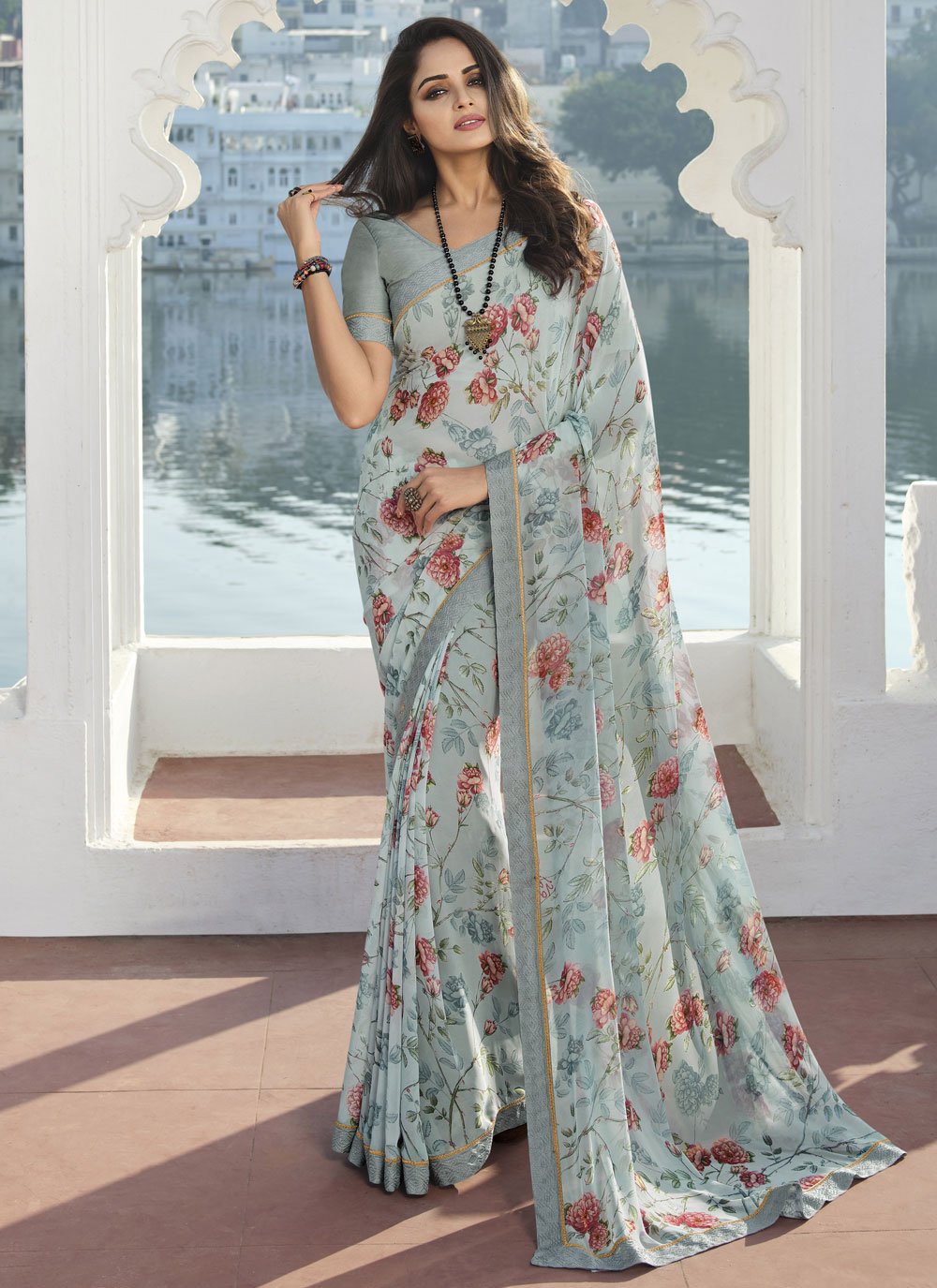 Contemporary Georgette Aqua Blue Print Saree