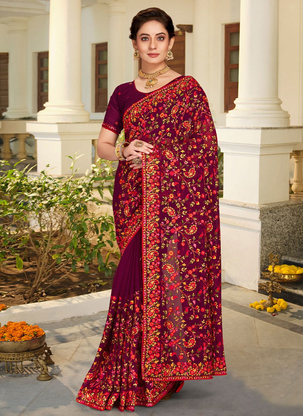 Classic Georgette Purple Embroidered Saree