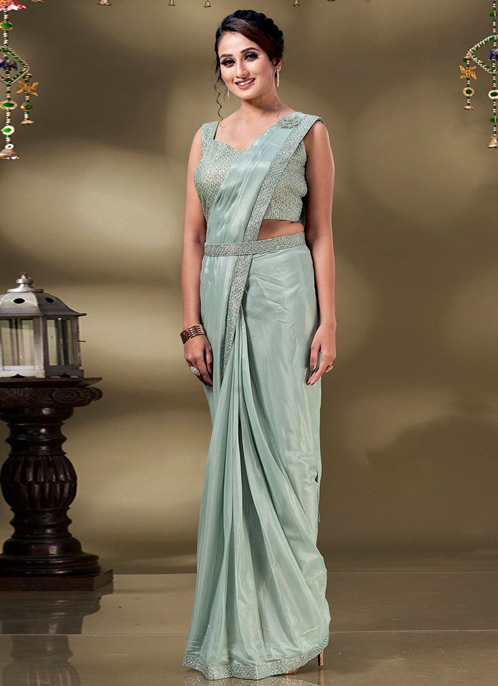 Contemporary Georgette Sea Green Patch Border Saree