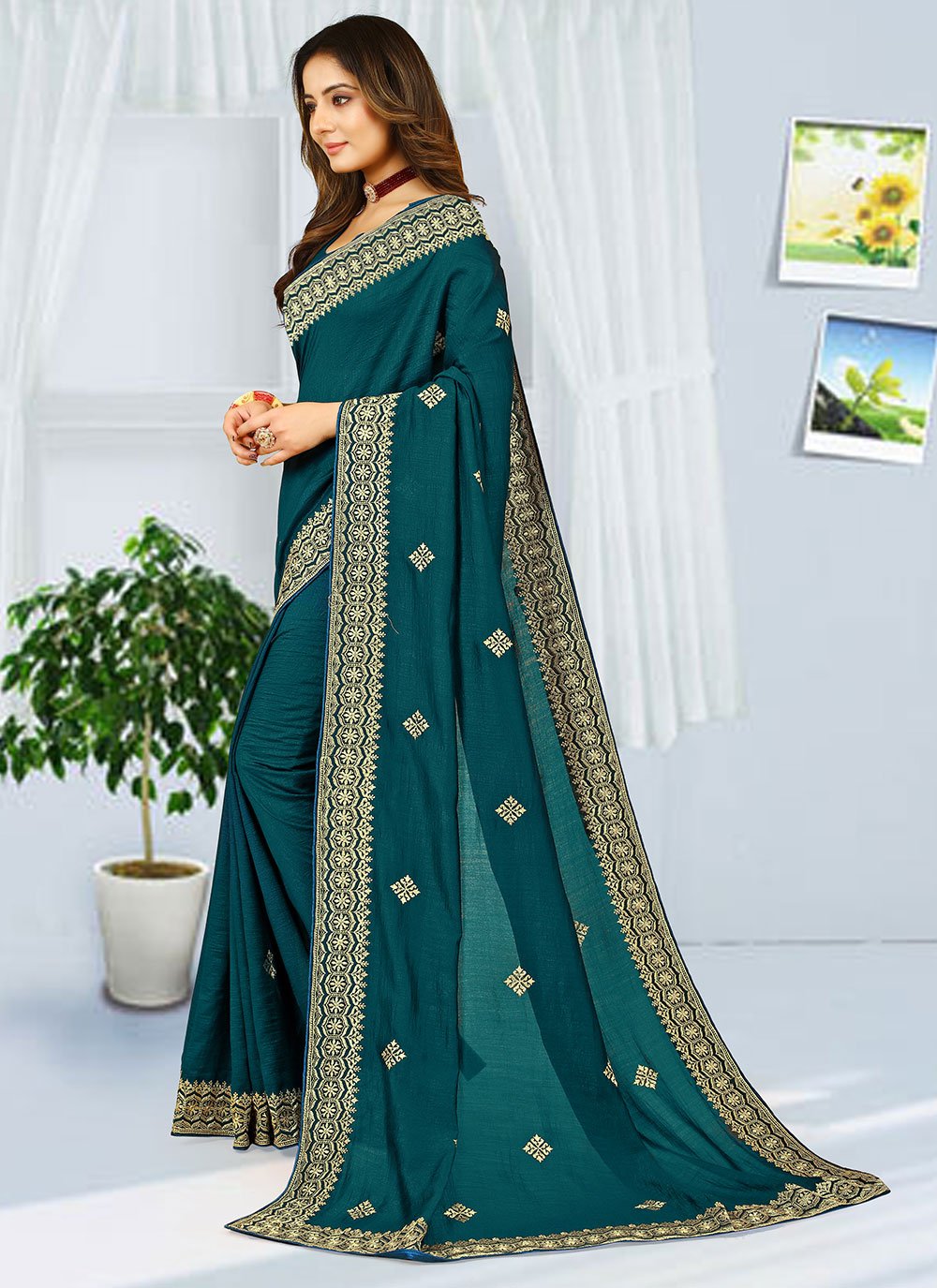 Contemporary Georgette Teal Embroidered Saree