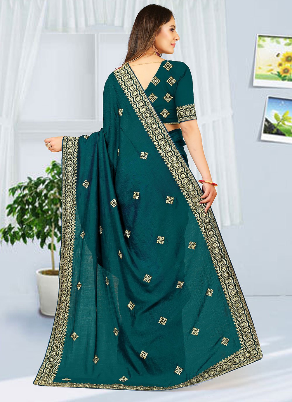 Contemporary Georgette Teal Embroidered Saree