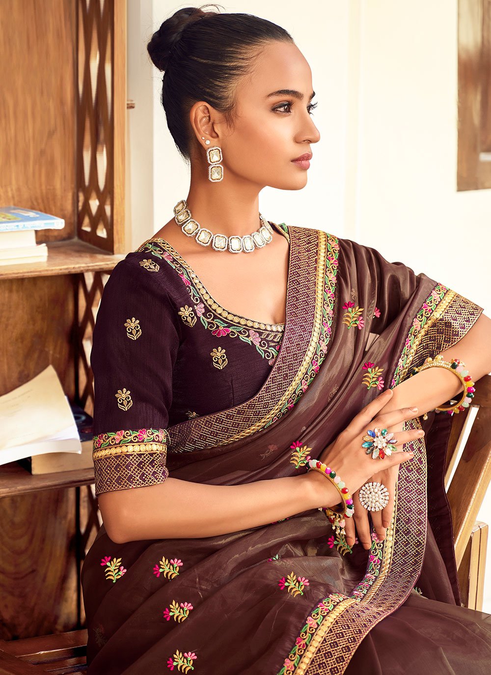 Classic Georgette Brown Embroidered Saree