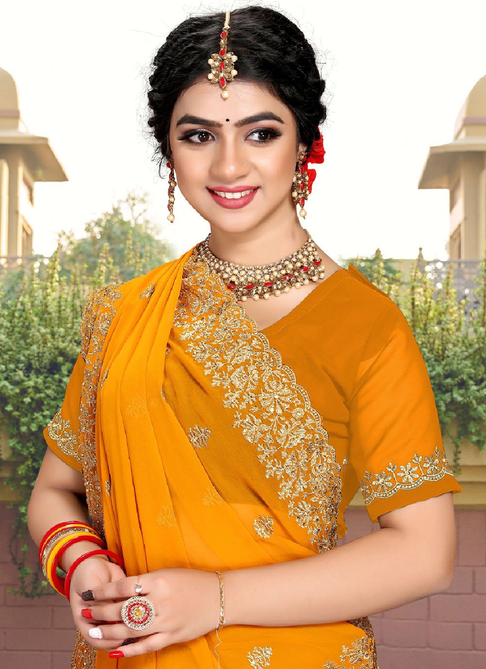 Classic Georgette Orange Embroidered Saree