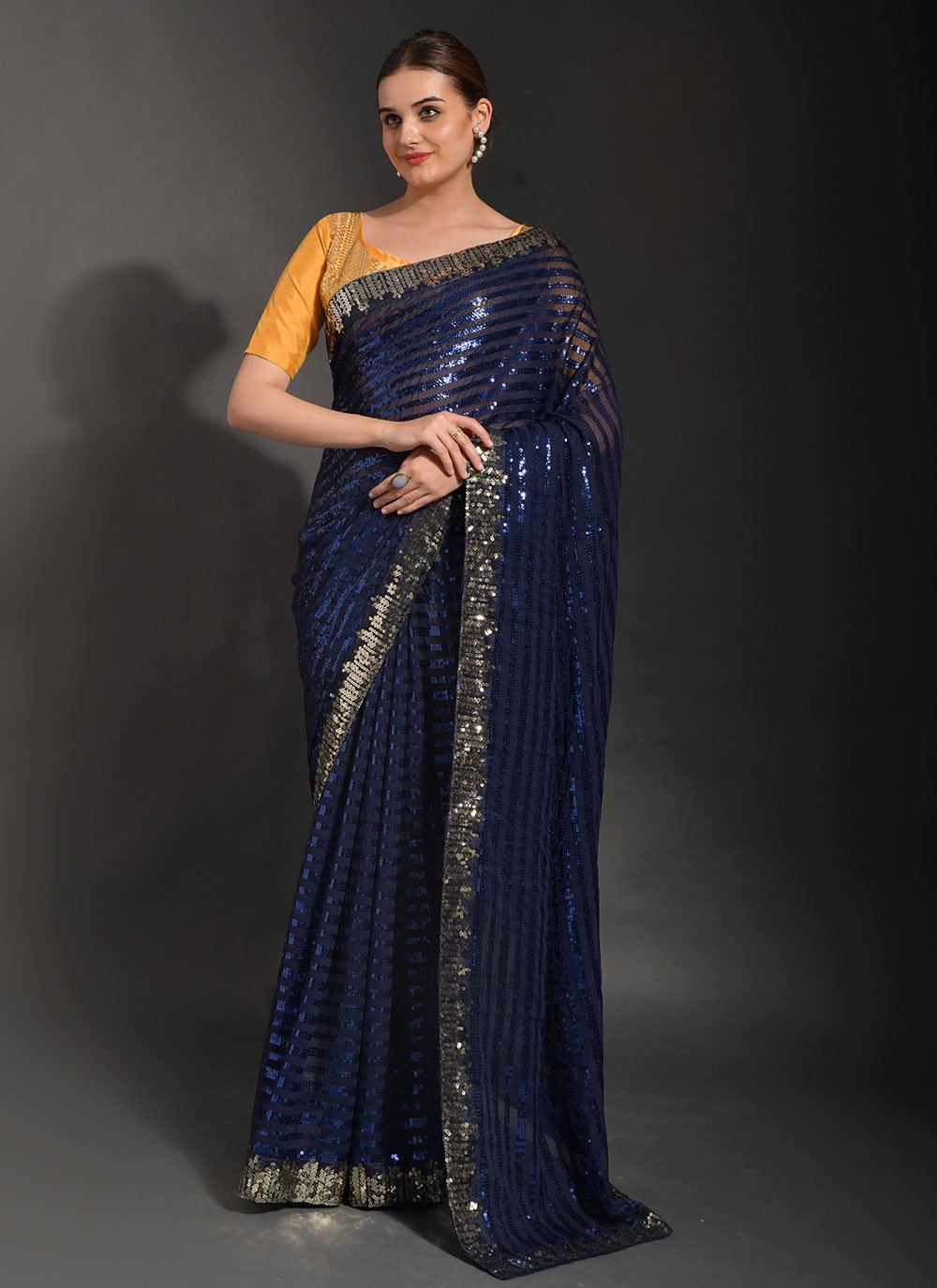 Classic Georgette Blue Embroidered Saree