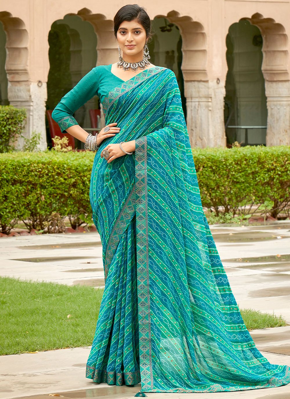 Contemporary Georgette Turquoise Print Saree