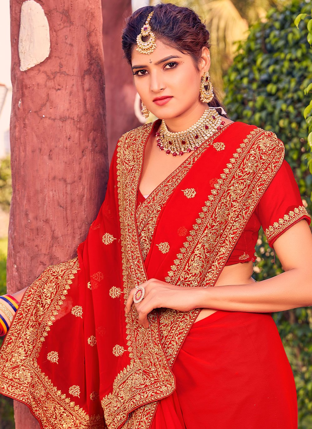 Classic Georgette Red Embroidered Saree