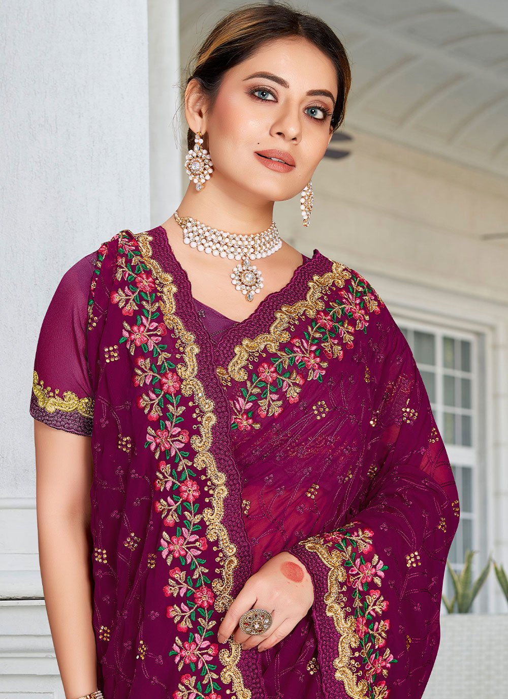 Classic Georgette Purple Embroidered Saree