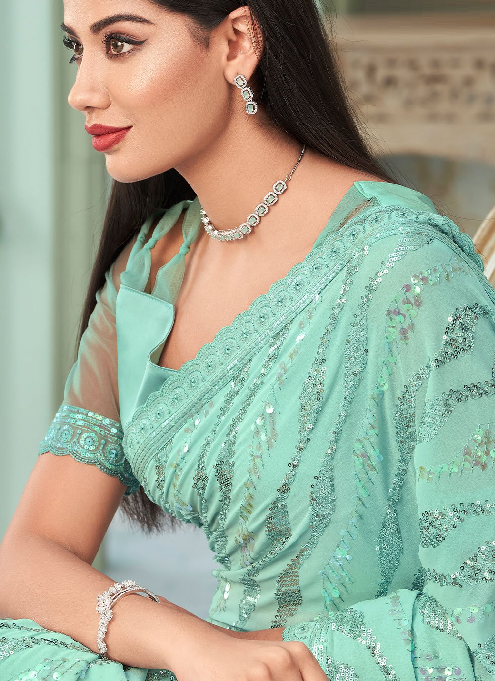 Classic Georgette Turquoise Sequins Saree