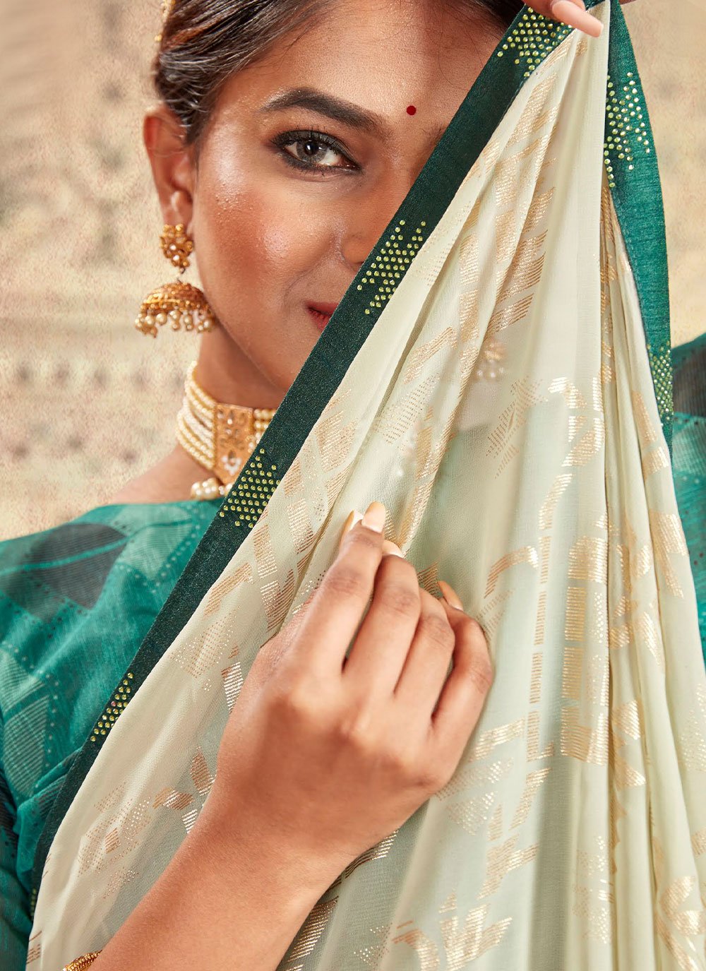 Classic Georgette Teal Embroidered Saree