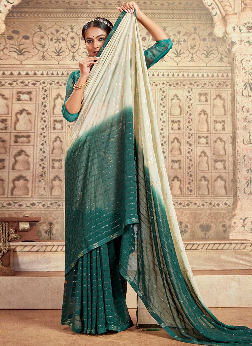 Classic Georgette Teal Embroidered Saree