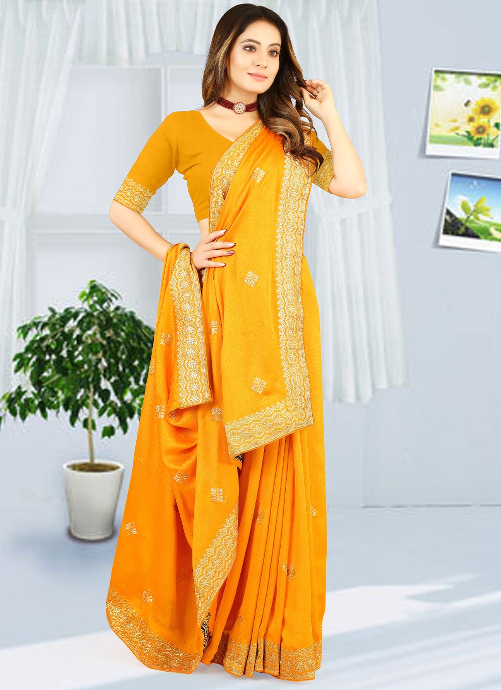 Classic Georgette Yellow Embroidered Saree