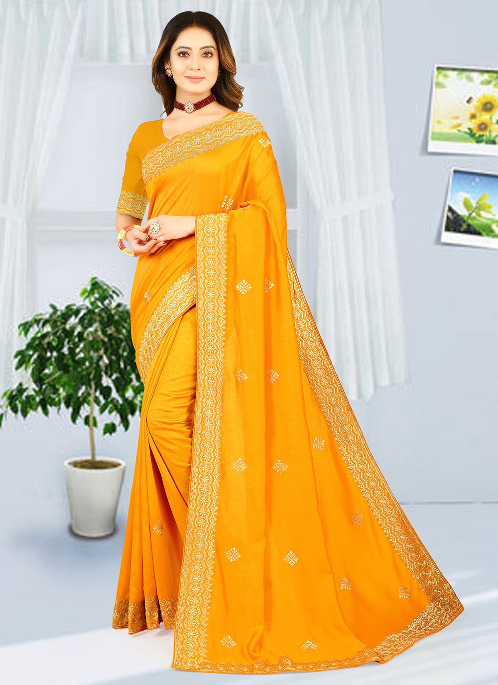 Classic Georgette Yellow Embroidered Saree