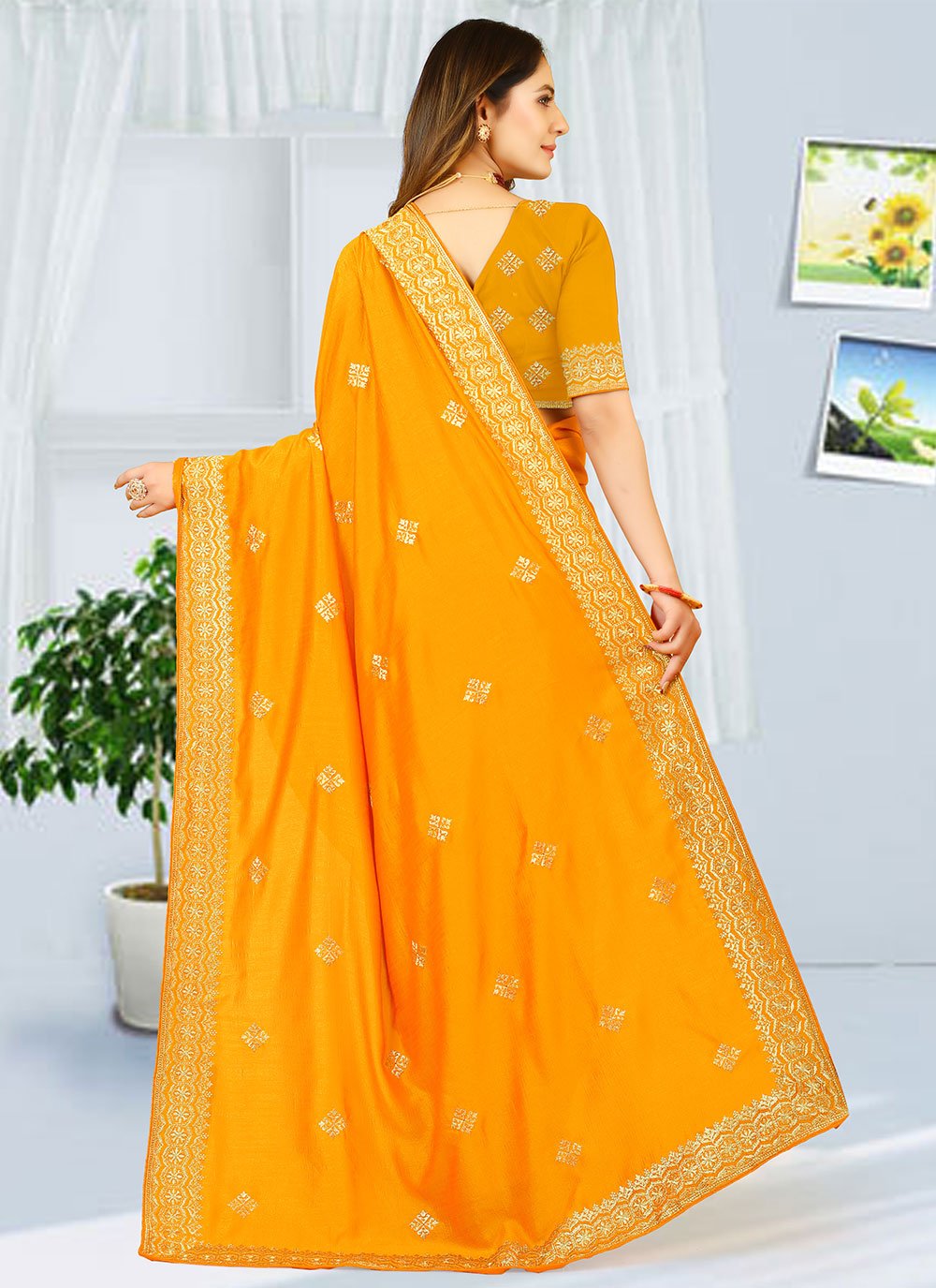 Classic Georgette Yellow Embroidered Saree