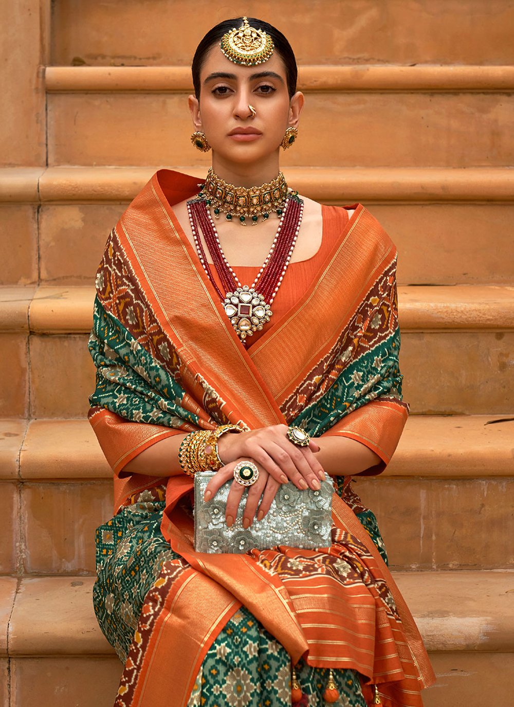 Contemporary Patola Silk Green Orange Weaving Saree