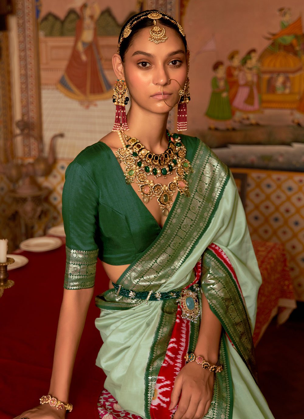 Contemporary Patola Silk Green Patch Border Saree