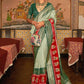 Contemporary Patola Silk Green Patch Border Saree