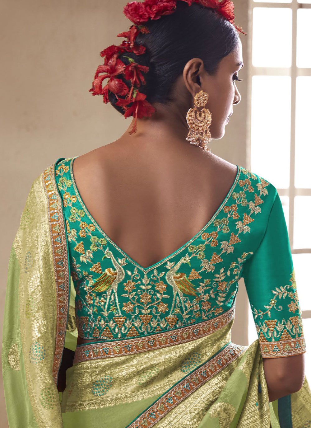 Classic Silk Green Embroidered Saree