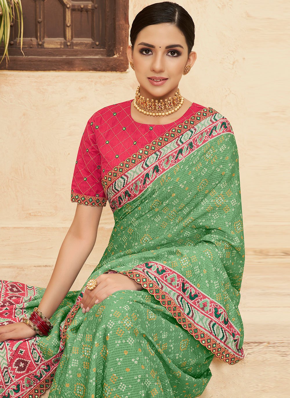 Contemporary Chinon Green Bandhej Saree