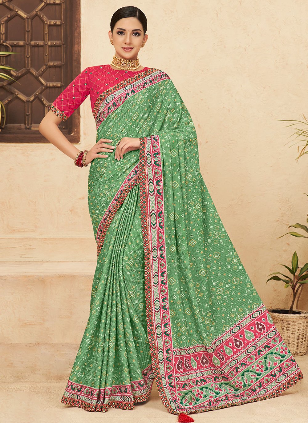 Contemporary Chinon Green Bandhej Saree