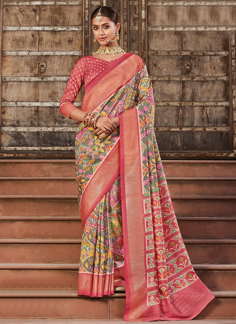 Contemporary Silk Grey Peach Patola Print Saree