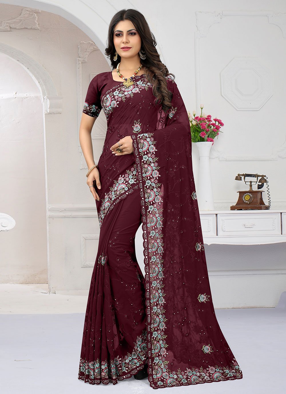 Classic Georgette Maroon Embroidered Saree