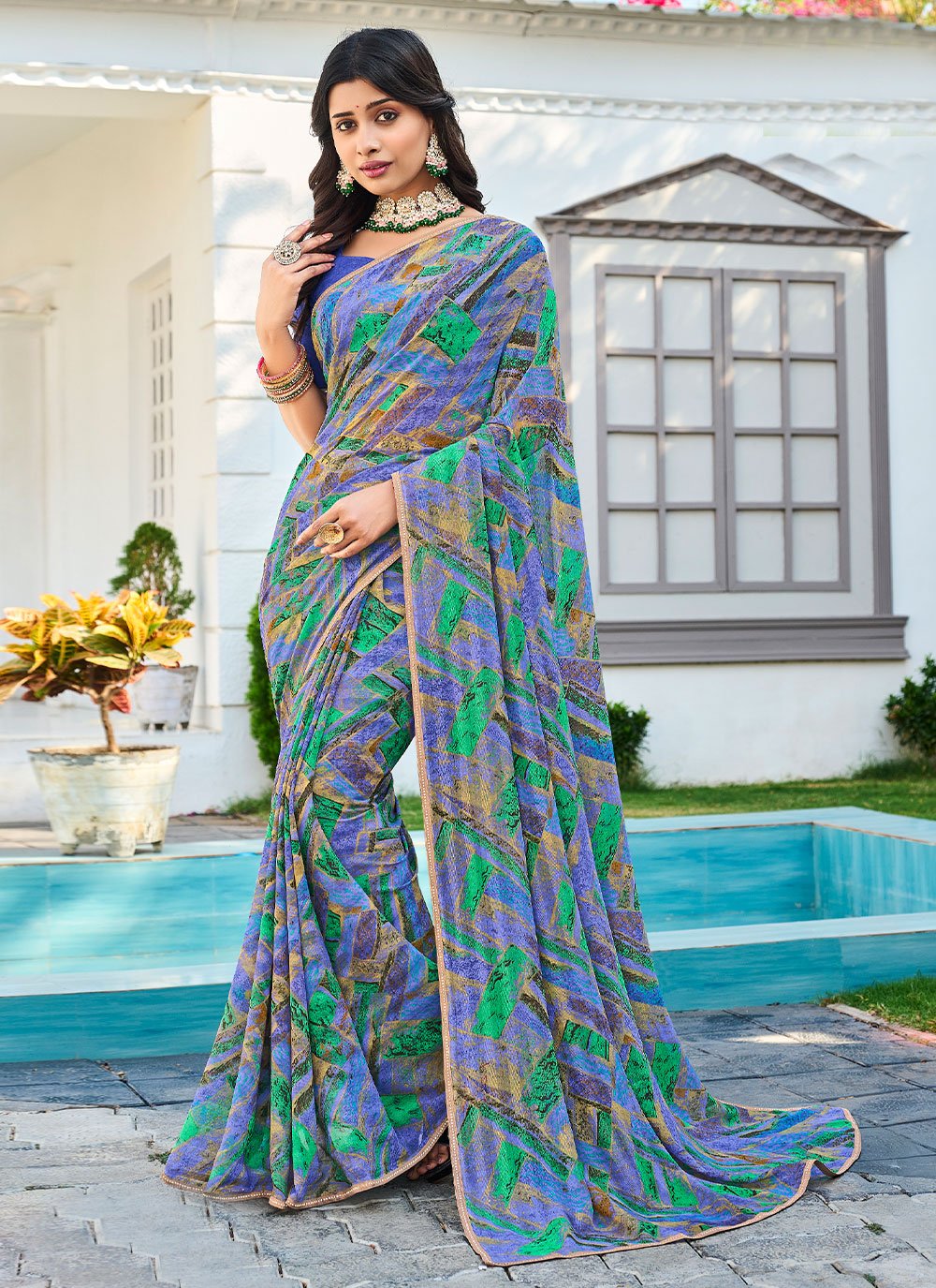 Classic Designer Georgette Multi Colour Fancy Work Saree