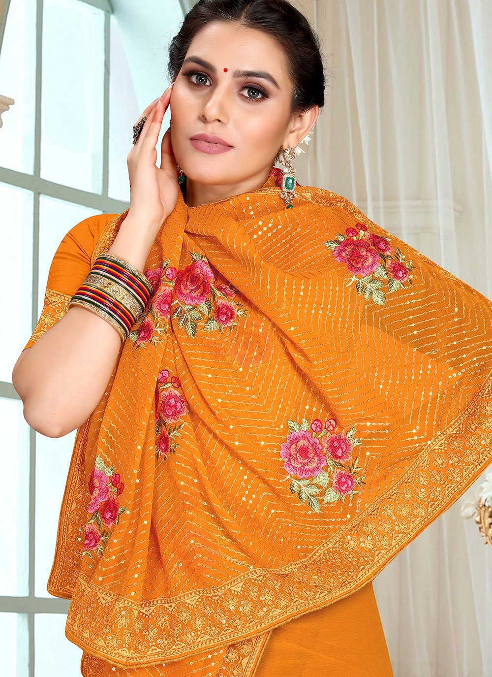 Contemporary Georgette Mustard Embroidered Saree