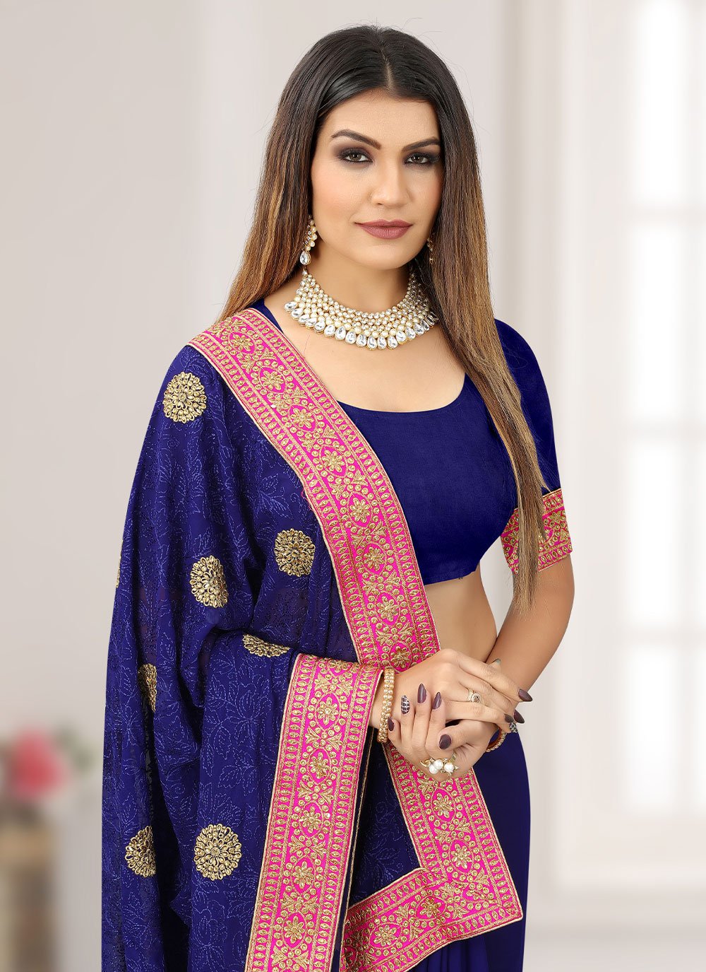 Classic Georgette Blue Embroidered Saree