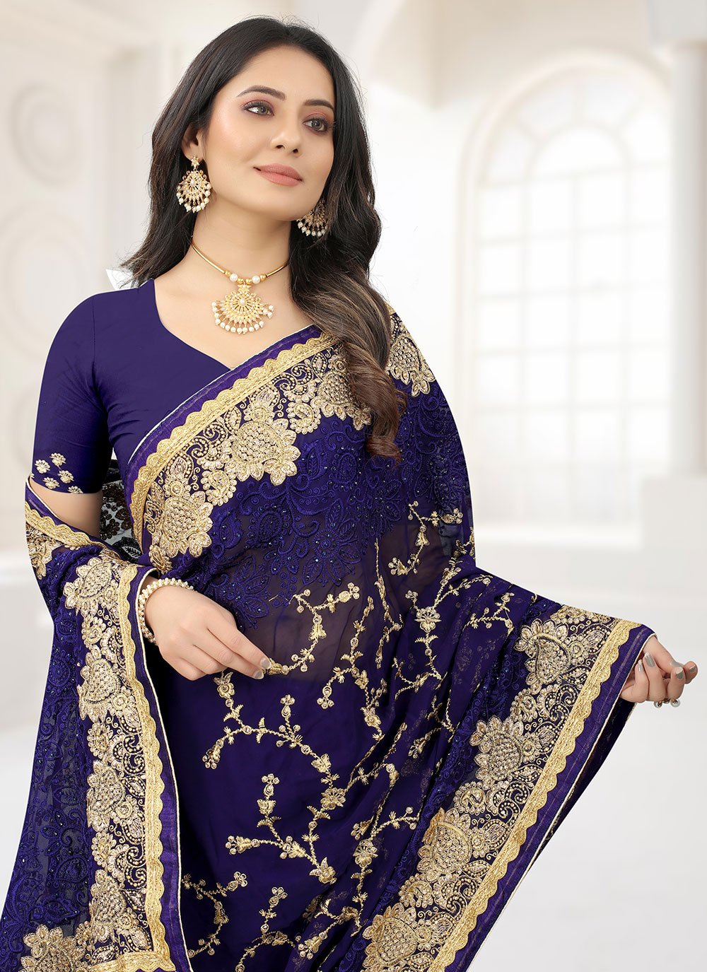 Classic Georgette Blue Embroidered Saree