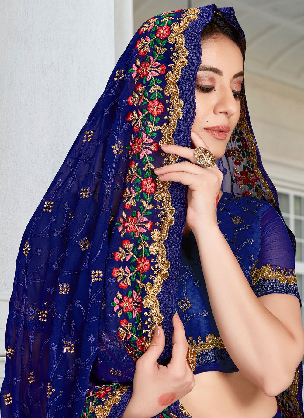 Classic Georgette Blue Embroidered Saree