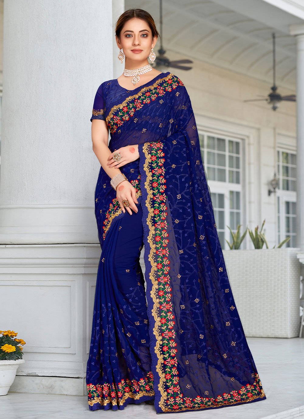 Classic Georgette Blue Embroidered Saree