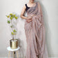 Classic Net Peach Sequins Saree