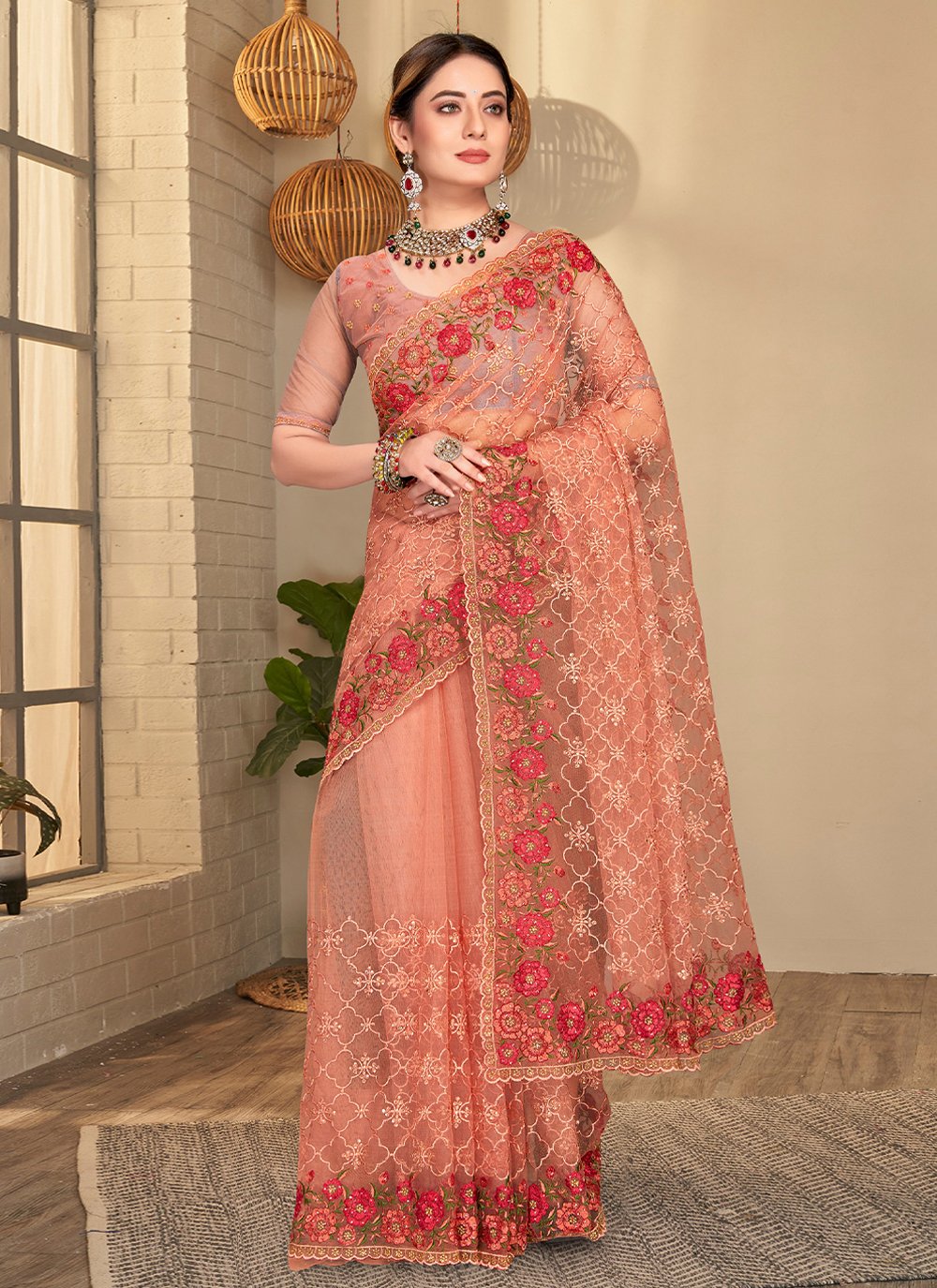 Designer Net Peach Embroidered Saree