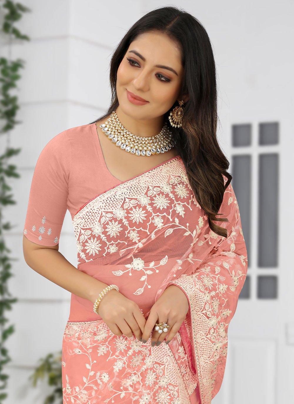 Designer Net Peach Embroidered Saree