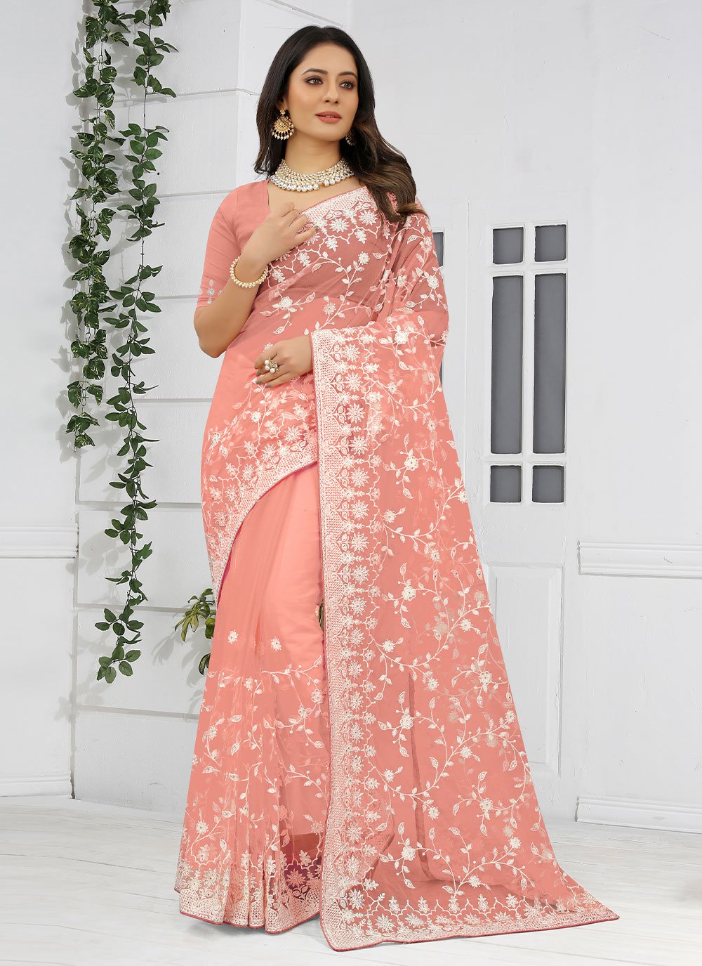 Designer Net Peach Embroidered Saree