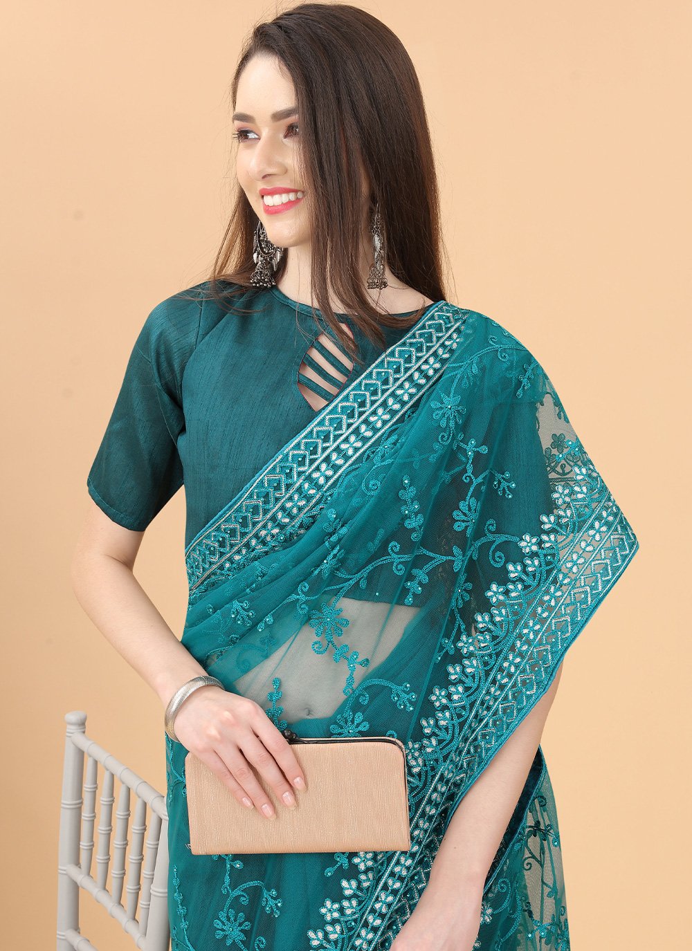 Contemporary Net Turquoise Aari Work Saree