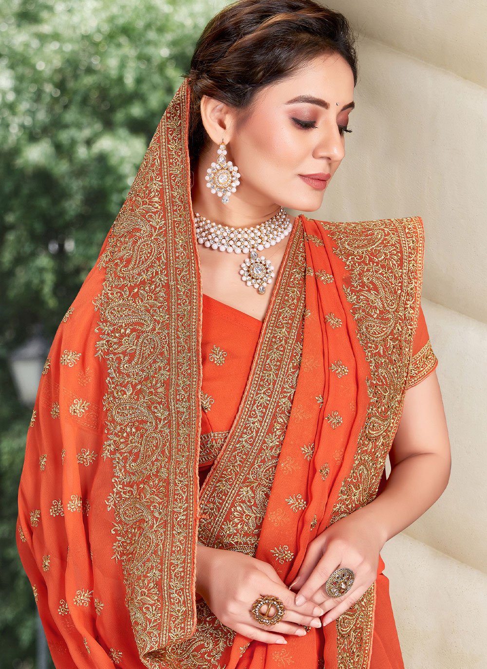 Contemporary Georgette Orange Embroidered Saree