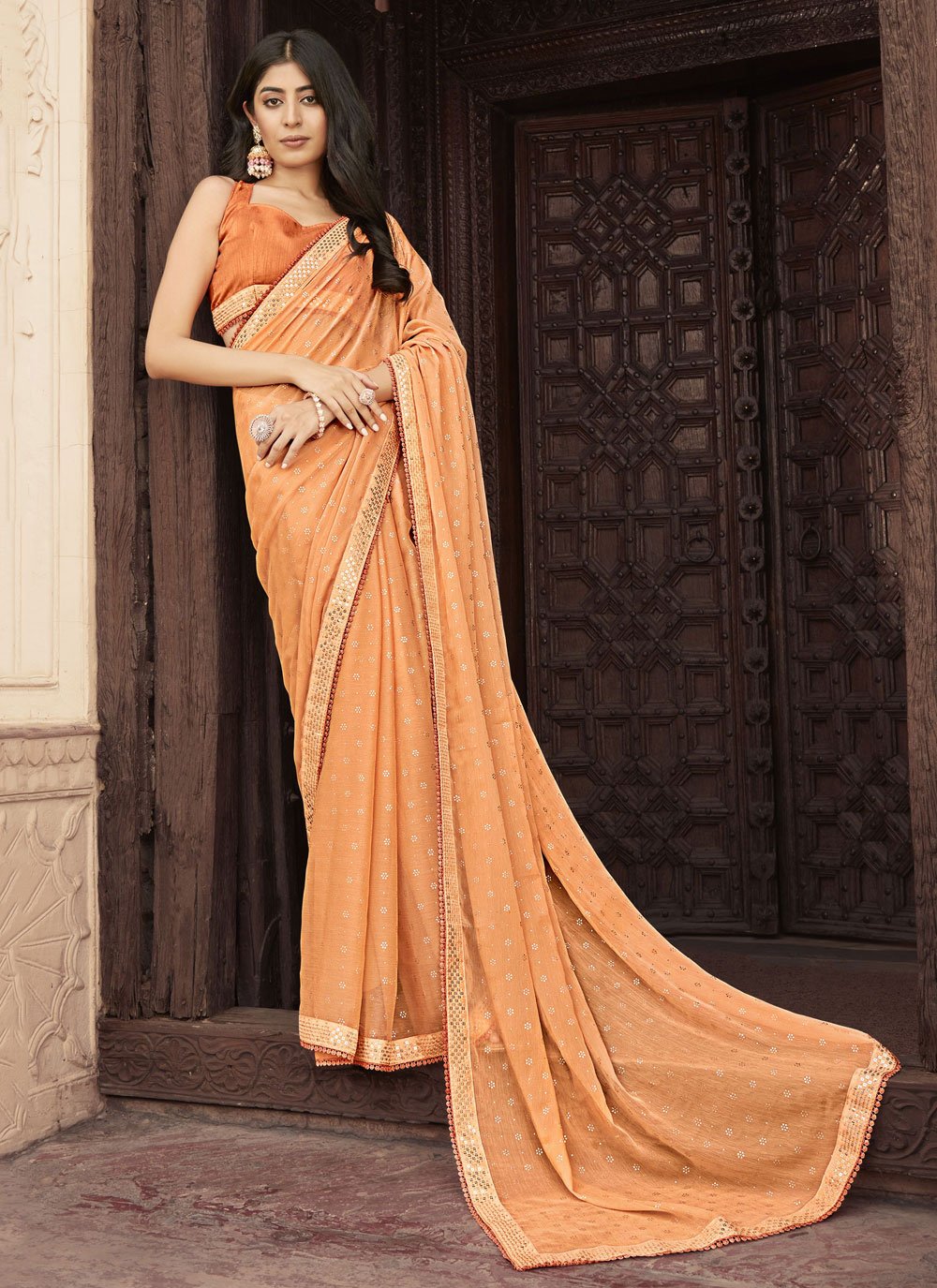 Contemporary Chiffon Orange Embroidered Saree