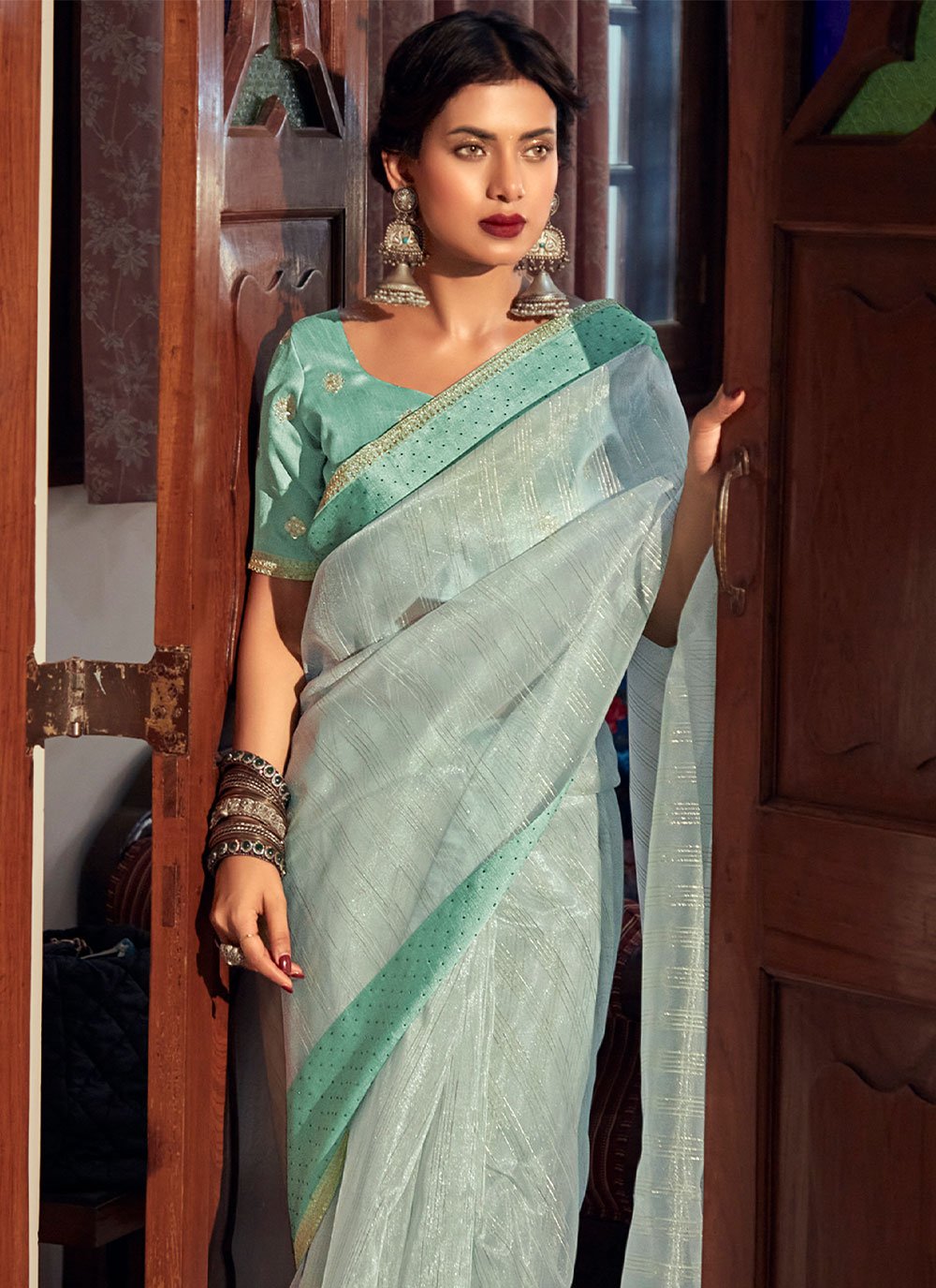 Contemporary Organza Sea Green Lace Saree